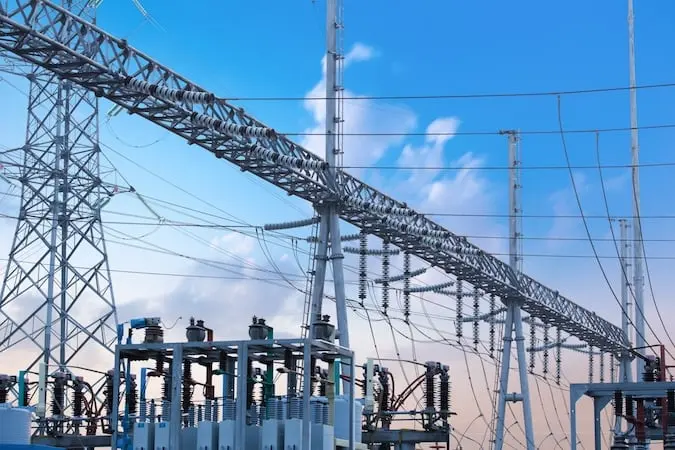 High-voltage T&D switchyard infrastructure for power transmission.